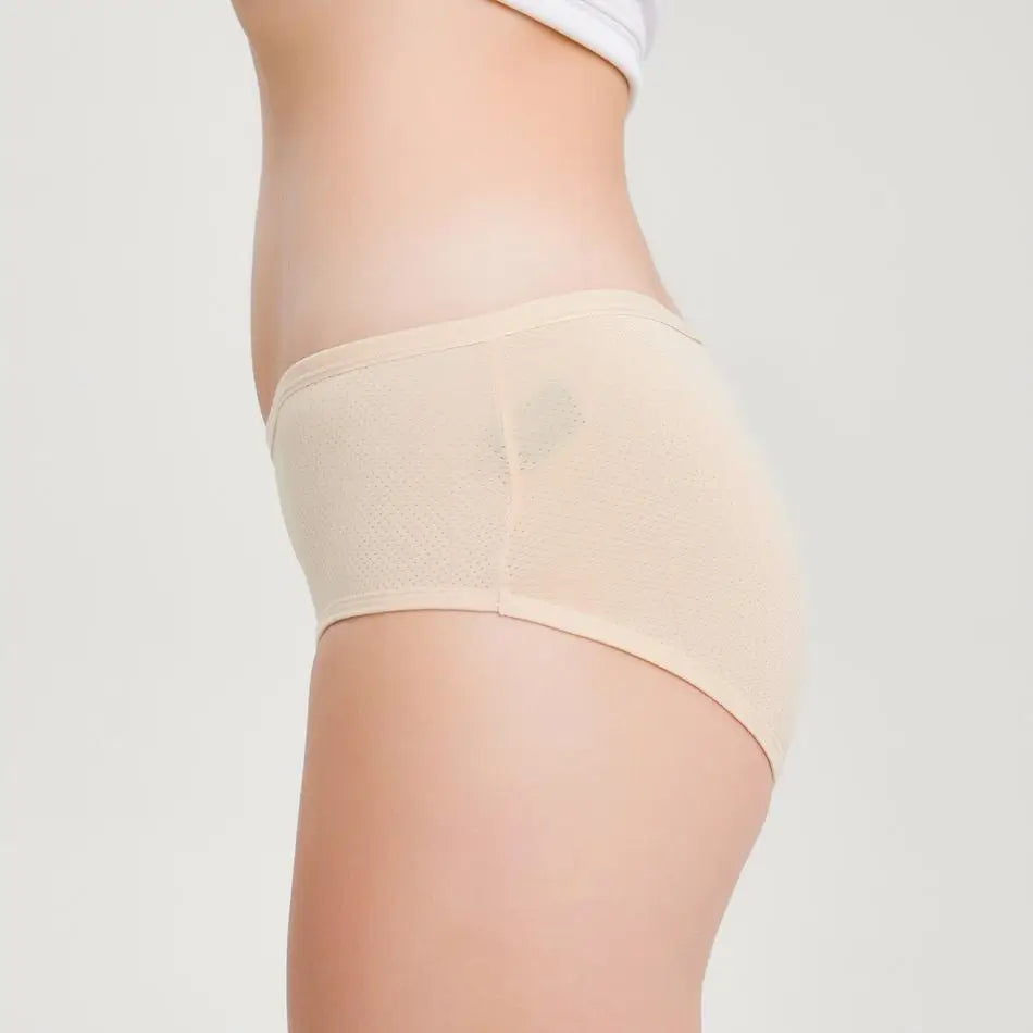 Hautfarbene Inkontinenz-Culotte für Damen, Seitenansicht.