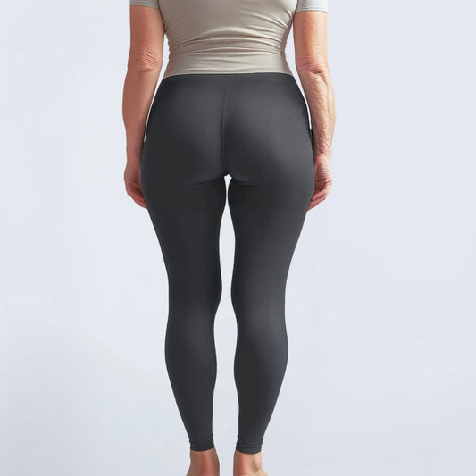 Schwarze Inkontinenz-Leggings für Damen, Rückansicht mit hoher Taille und nahtlosem Design.