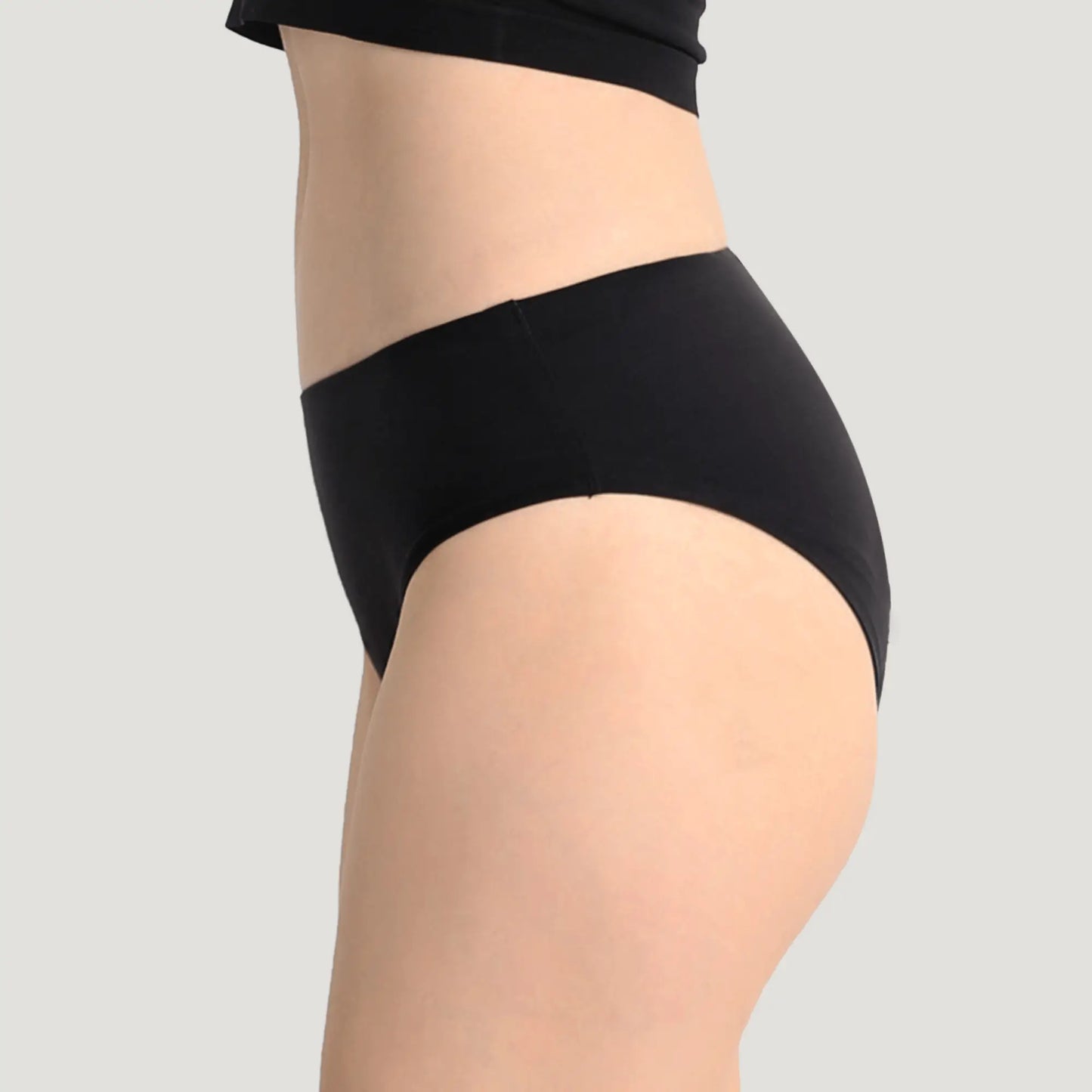 Schwarze hochtaillierte Inkontinenzslip für Damen, Seitenansicht.