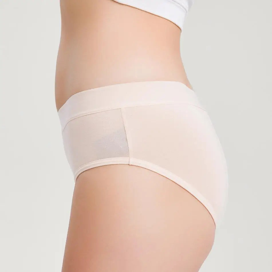 Beigefarbene Inkontinenz-Culotte für Damen, Seitenansicht.